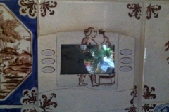 thermostat painted to match tile
