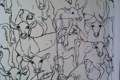 cow design from wallpaper painted onto panel