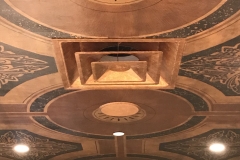 fixtures gilded to match mural colors